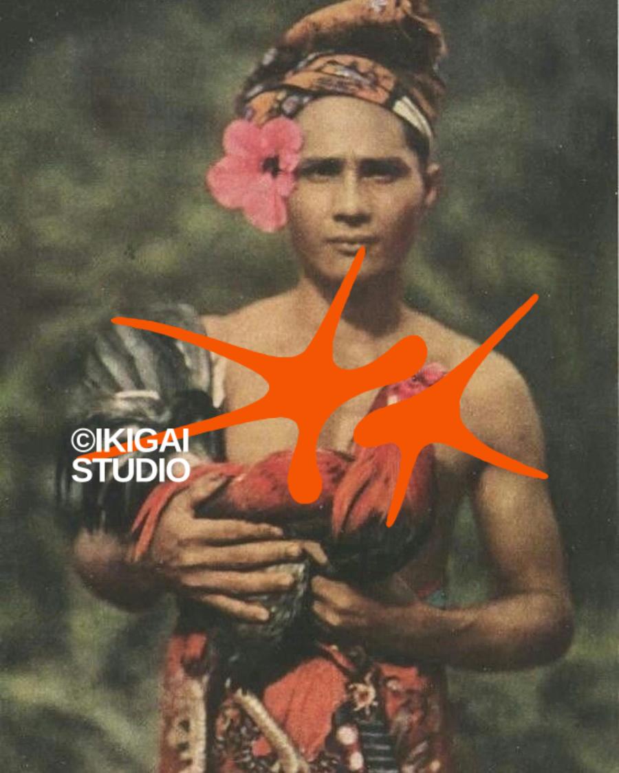 Vintage portrait of a Balinese man holding a rooster